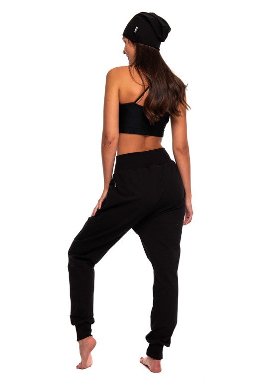 Black drop-crotch sweatpants for women, men, and children.