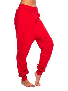 Red drop-crotch tracksuit pants for women, men, and kids.